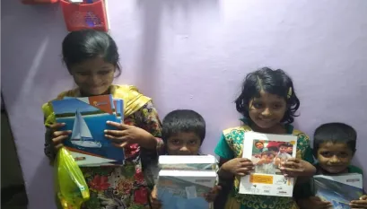 Children receiving education materials